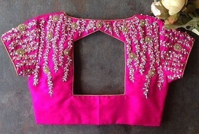 Delicate embroidery geometric cut back blouse design
