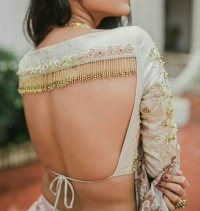 Heavy embellished backless blouse for weddings