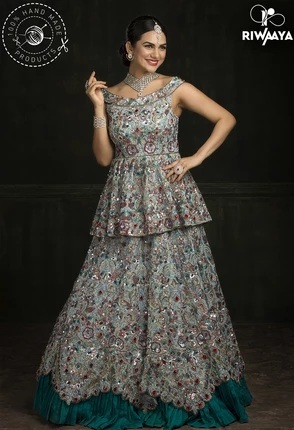 Sleeveless long peplum style blouse for lehenga