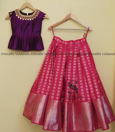 Sleeveless purple short peplum style silk lehenga blouse