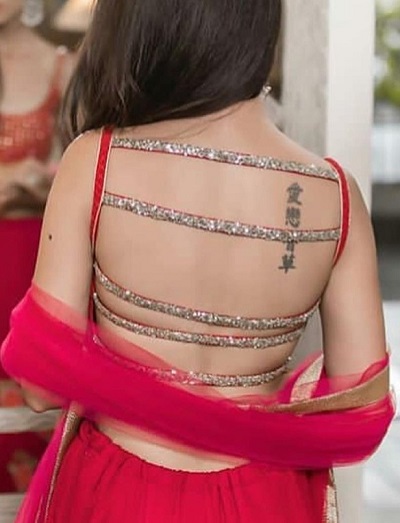 Backless sarees and lehenga with embellished