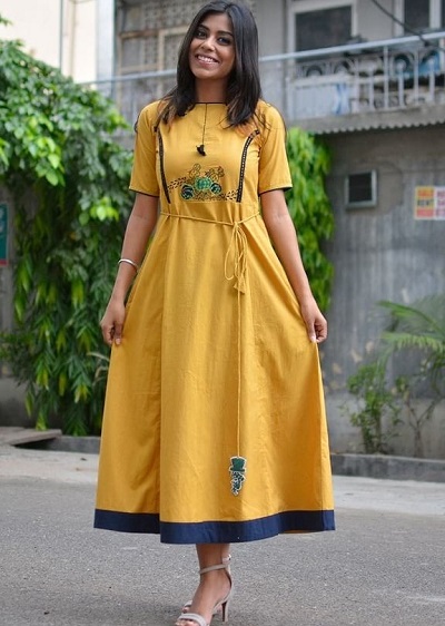 Yellow Solid Embroidered Cotton Kurti